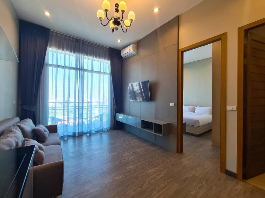 Postel nebo postele na pokoji v ubytování UR The Private Huahin