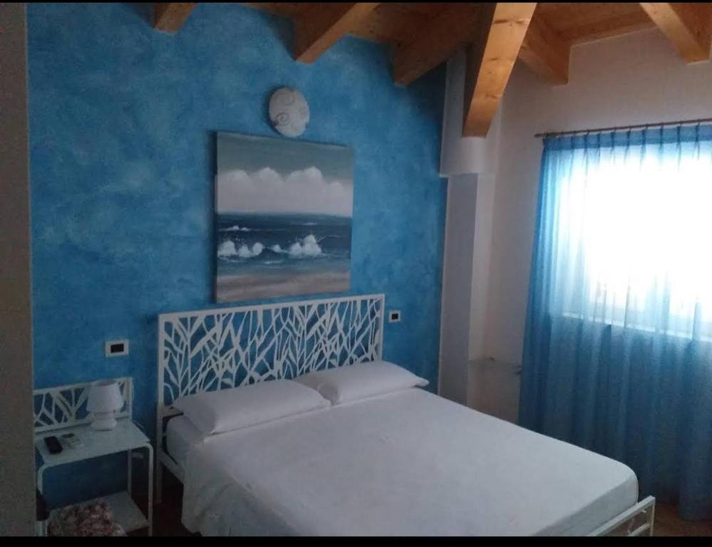 Postel nebo postele na pokoji v ubytování Villa Imago