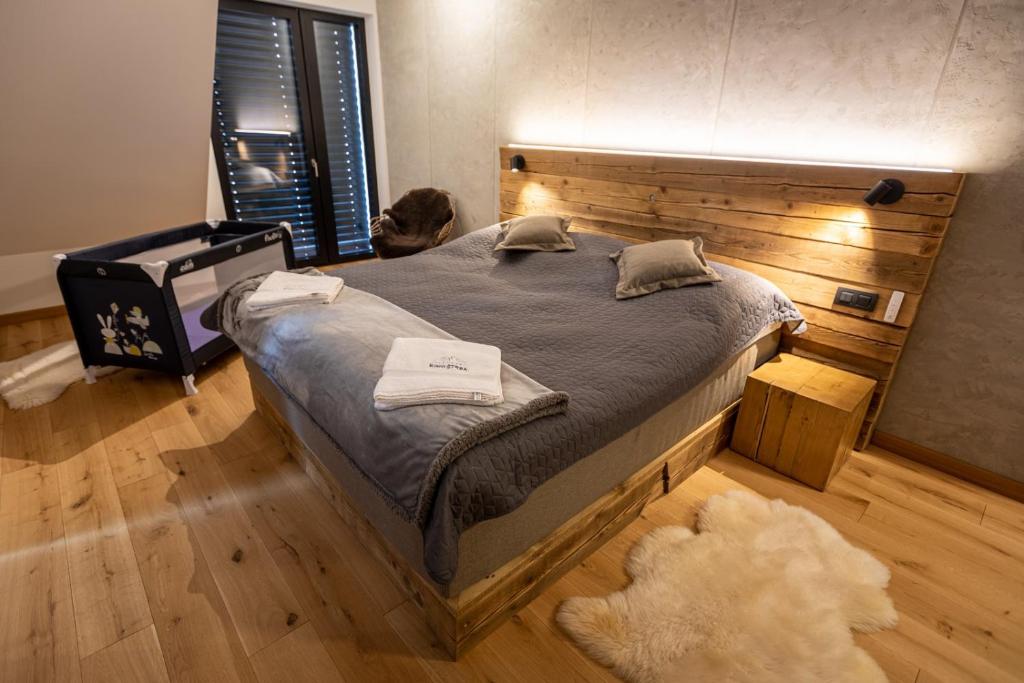 Postel nebo postele na pokoji v ubytování Kino Strba Apartments