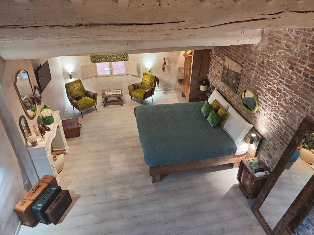 an overhead view of a bedroom and a living room at Il Pozzo di Santa Zita in Lucca