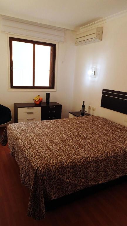 Postel nebo postele na pokoji v ubytování Apt 409 Los Gigantes