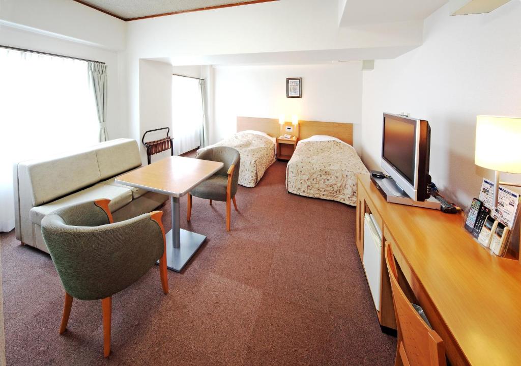TV a/nebo společenská místnost v ubytování Hotel Sun Plaza Sakai
