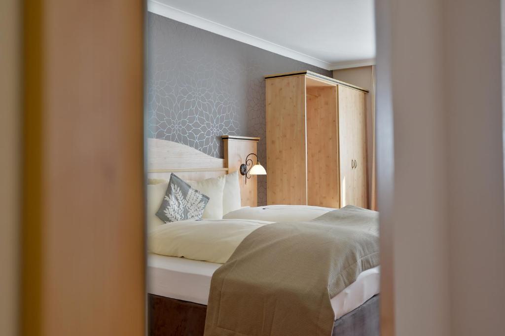 Posteľ alebo postele v izbe v ubytovaní Hotel Mesnerwirt