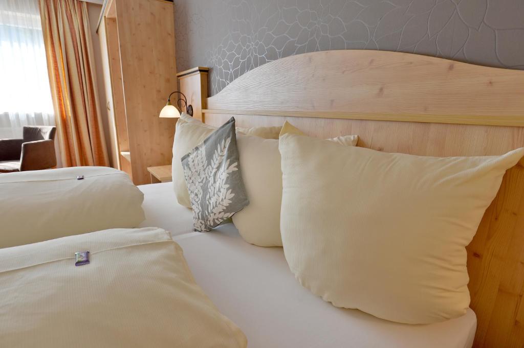 Posteľ alebo postele v izbe v ubytovaní Hotel Mesnerwirt