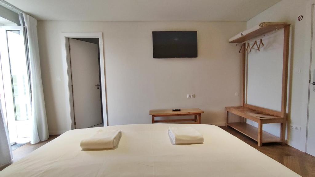 Postel nebo postele na pokoji v ubytování Mid-Atlantic Boutique Hostel