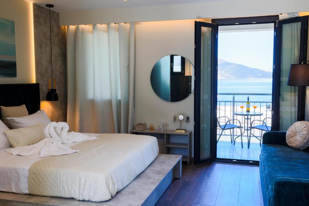 Postel nebo postele na pokoji v ubytování SAMI BEACHVIEW