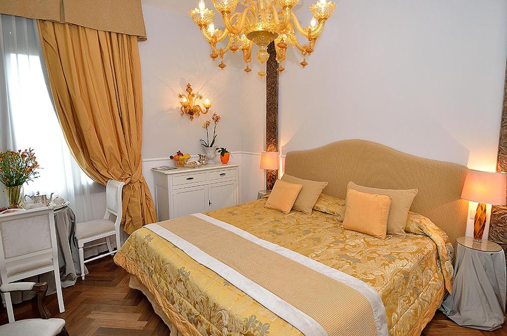 Un ou plusieurs lits dans un hébergement de l'établissement B&B Villa Ines