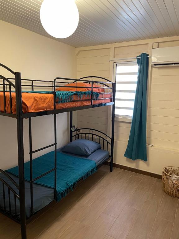 Postel nebo postele na pokoji v ubytování Villa Anse Mitan