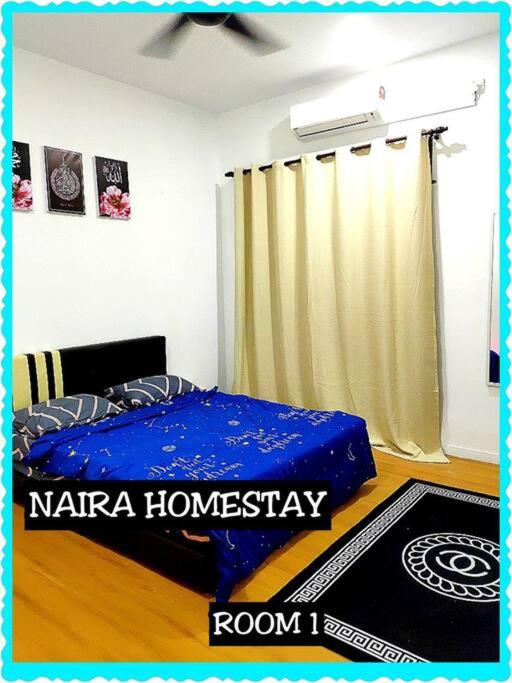Postel nebo postele na pokoji v ubytování Naira Homestay Kota Bharu ,Wakaf Che Yeh 4 Bilik 3 Aircond
