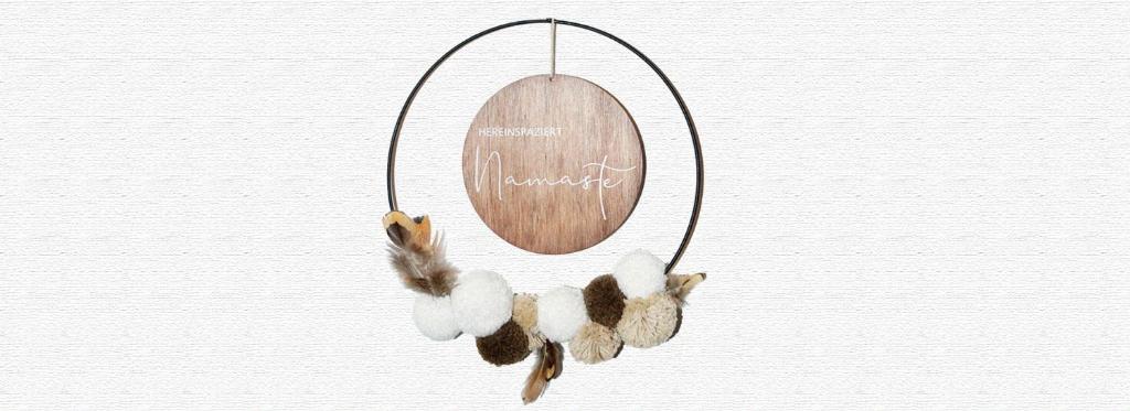 a group of ducks hanging from a mirror at Bergkristall Apartments in Ischgl