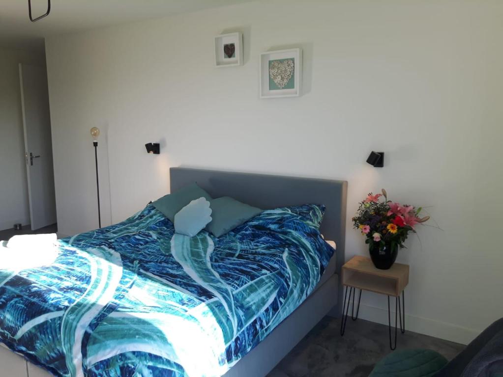 Postel nebo postele na pokoji v ubytování Bed no breakfast de Kapitein