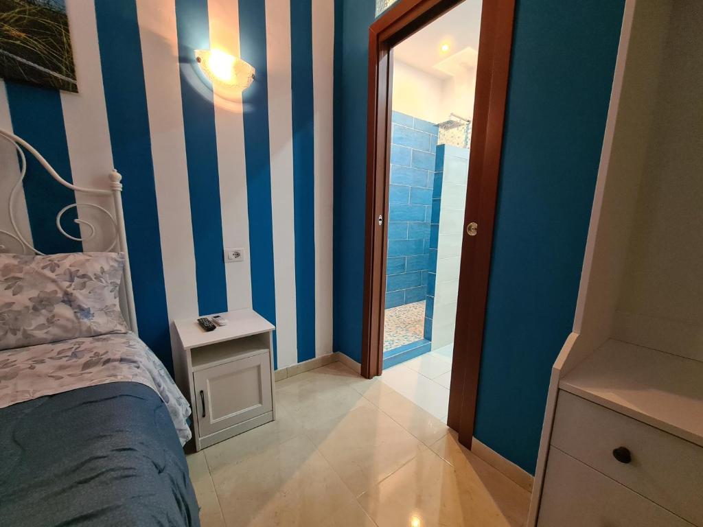 Postel nebo postele na pokoji v ubytování Domus Lace