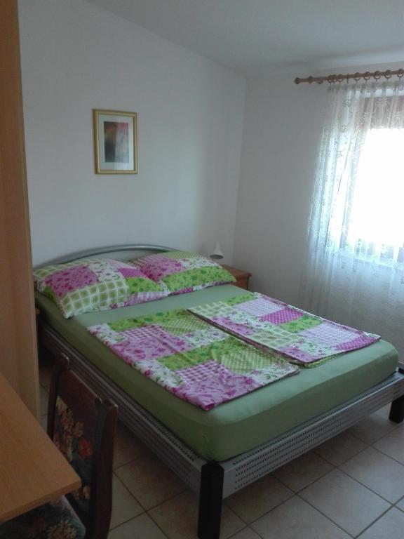 Posteľ alebo postele v izbe v ubytovaní Apartman Vir Gogo br 4