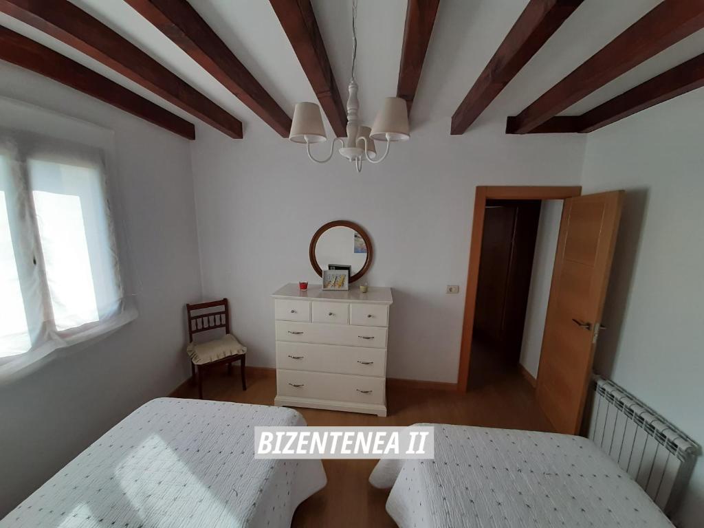 Cama o camas de una habitación en Bizentenea