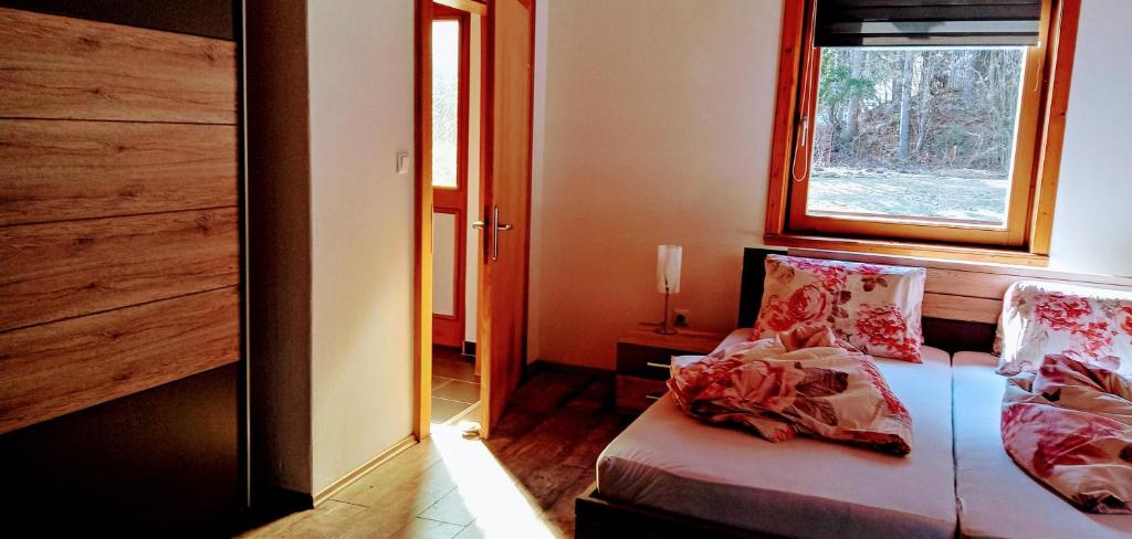 Postel nebo postele na pokoji v ubytování Ferienwohnungen Miklautsch