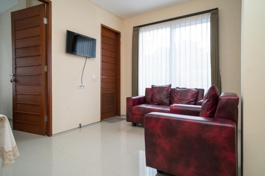 TV a/nebo společenská místnost v ubytování RedDoorz near ITDC Nusa Dua