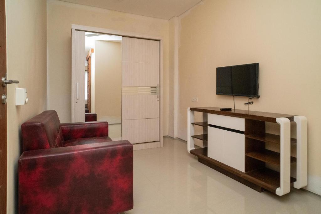 TV a/nebo společenská místnost v ubytování RedDoorz near ITDC Nusa Dua