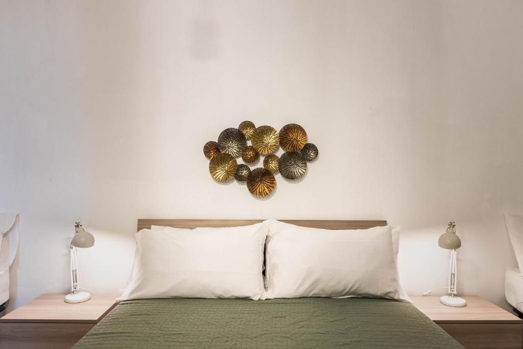 A bed or beds in a room at Trigona 4 Apartment