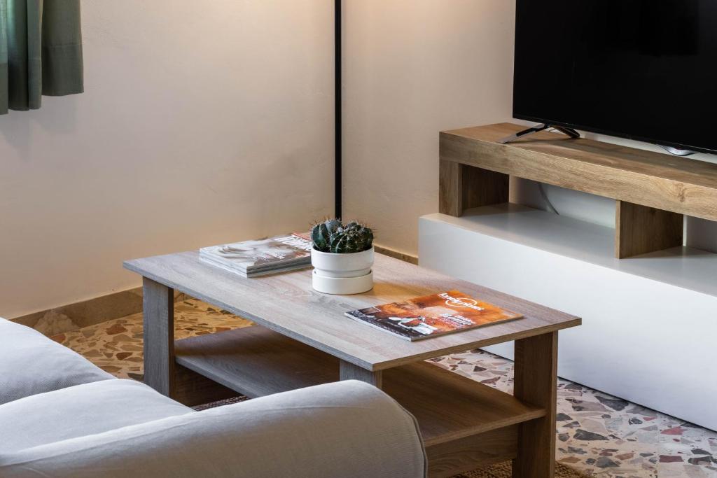 A television and/or entertainment centre at Trigona 4 Apartment