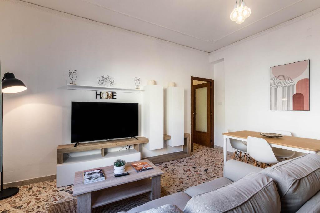 A television and/or entertainment centre at Trigona 4 Apartment