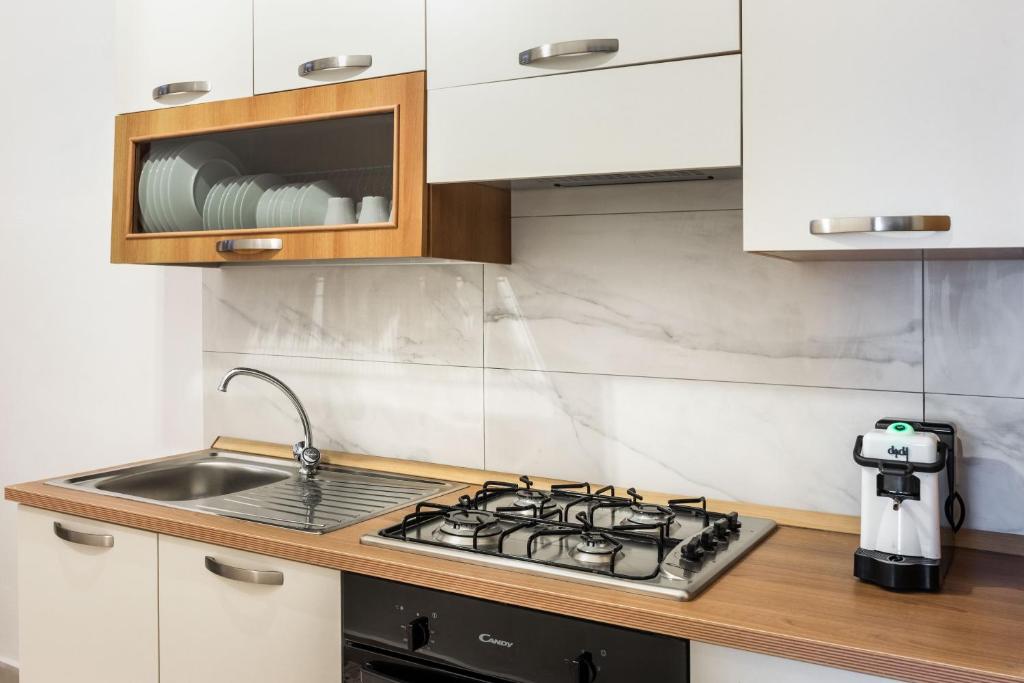 A kitchen or kitchenette at Trigona 4 Apartment