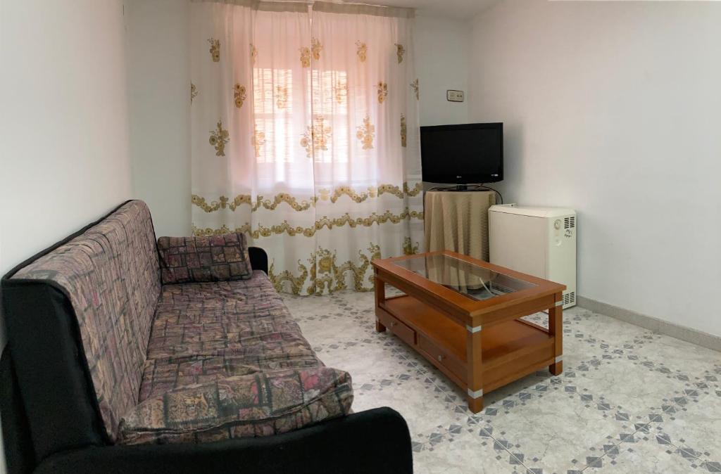 A television and/or entertainment centre at La Casa de la Abuela