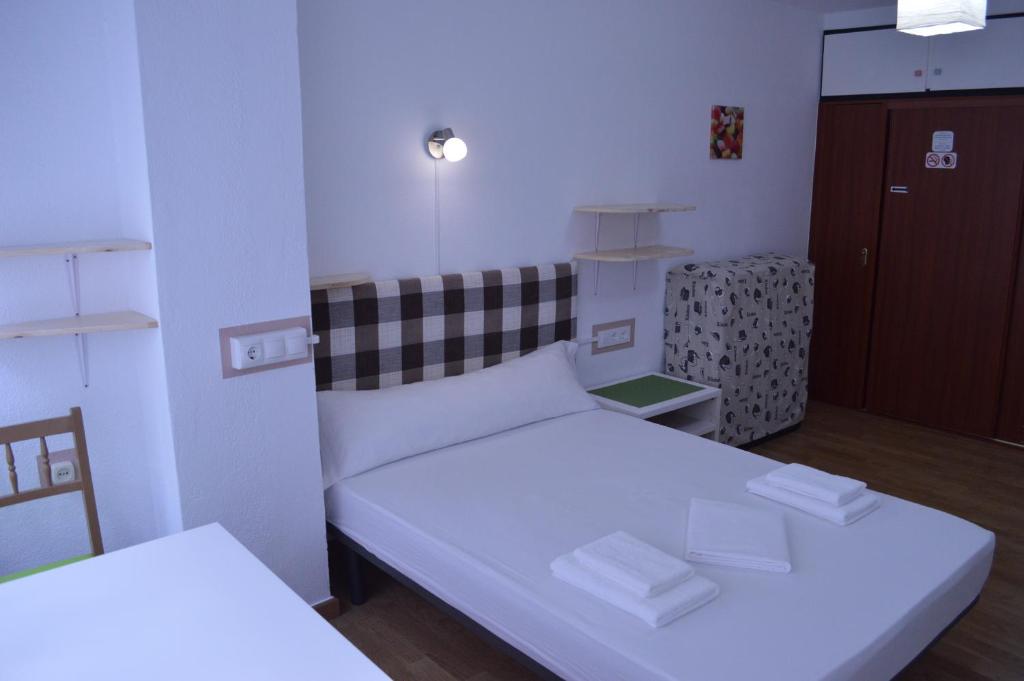 Postel nebo postele na pokoji v ubytování ArArAt Hostel