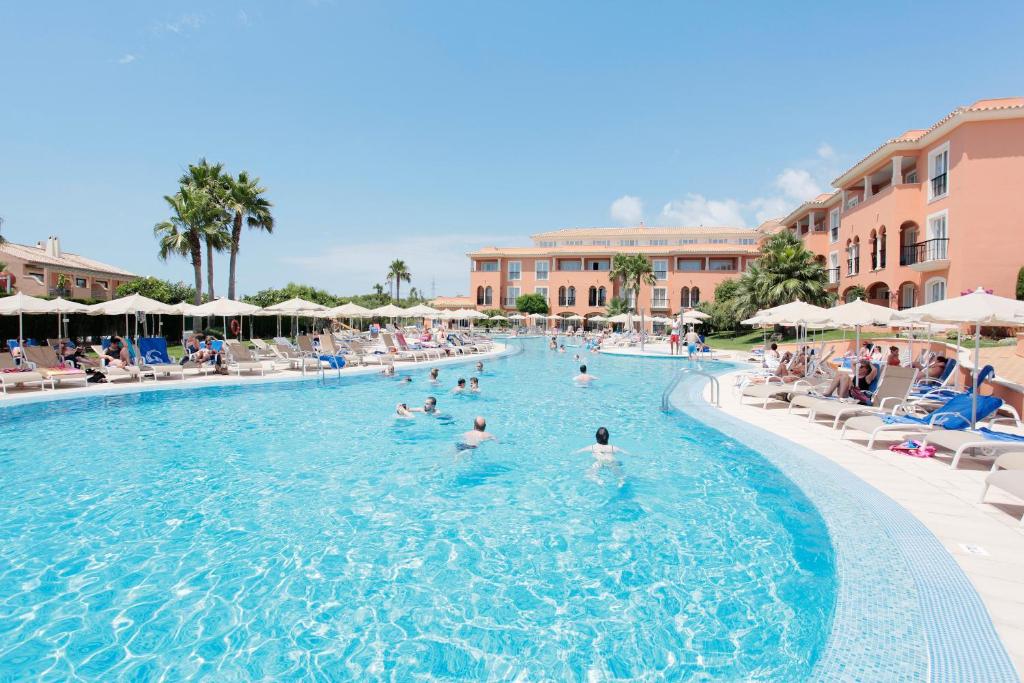 The swimming pool at or close to Grupotel Macarella Suites & Spa