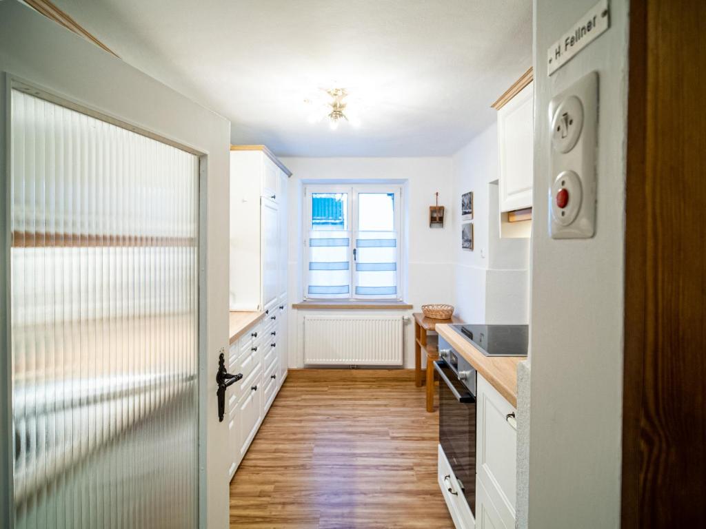 Kuchyň nebo kuchyňský kout v ubytování Katzerhaus Ebensee
