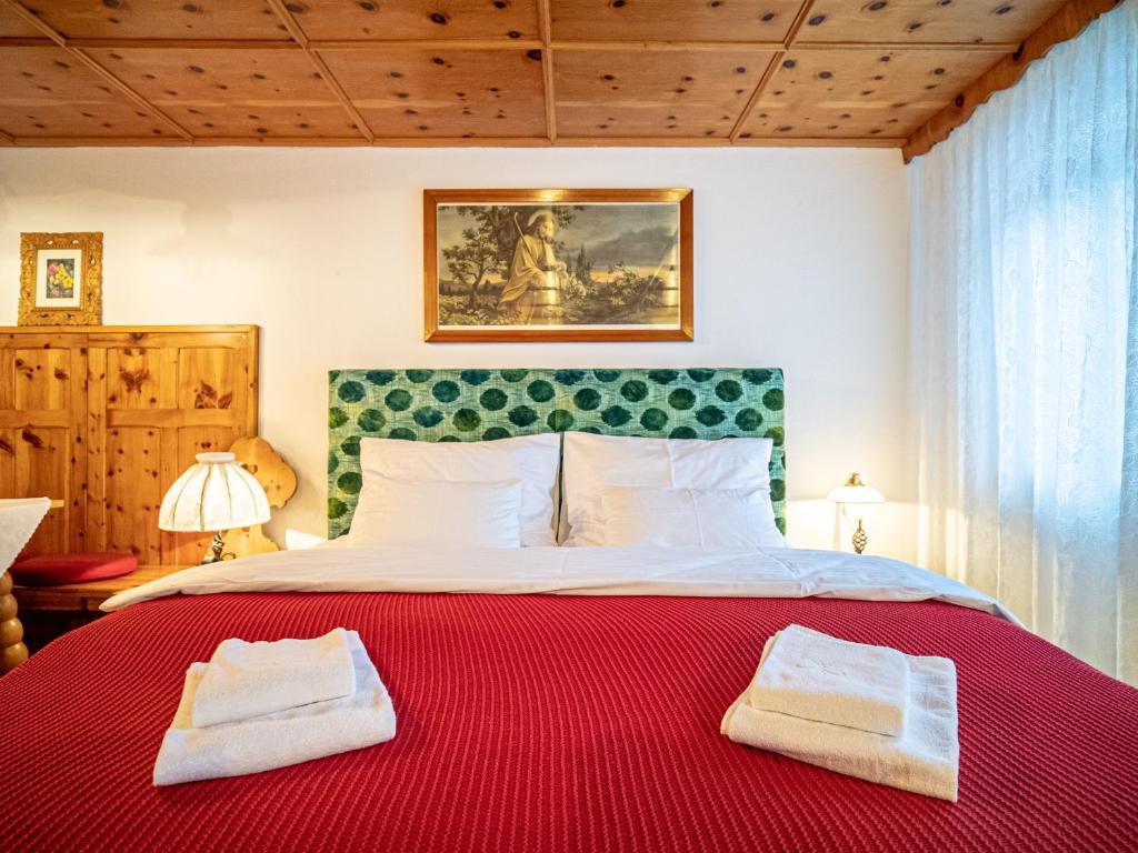 Postel nebo postele na pokoji v ubytování Katzerhaus Ebensee
