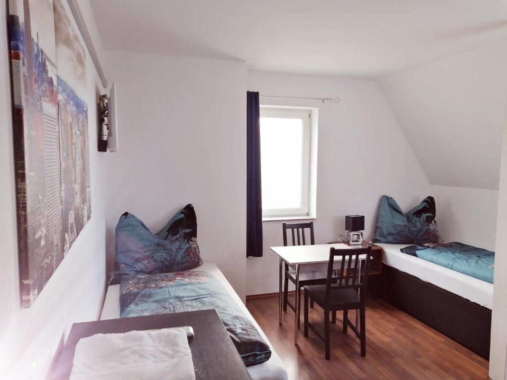 Postel nebo postele na pokoji v ubytování Motel Graz Ost