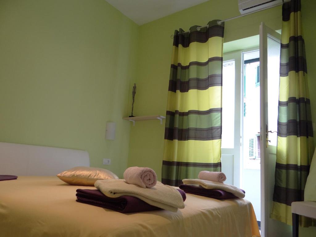 Postel nebo postele na pokoji v ubytování Rooms Stella