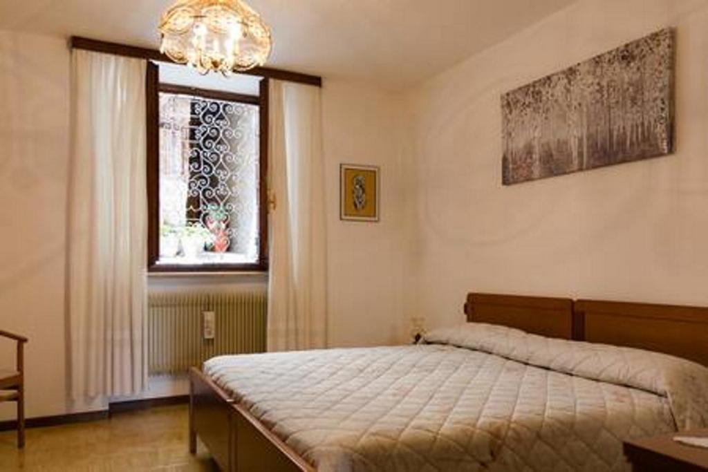 Postel nebo postele na pokoji v ubytování Apartment Serena