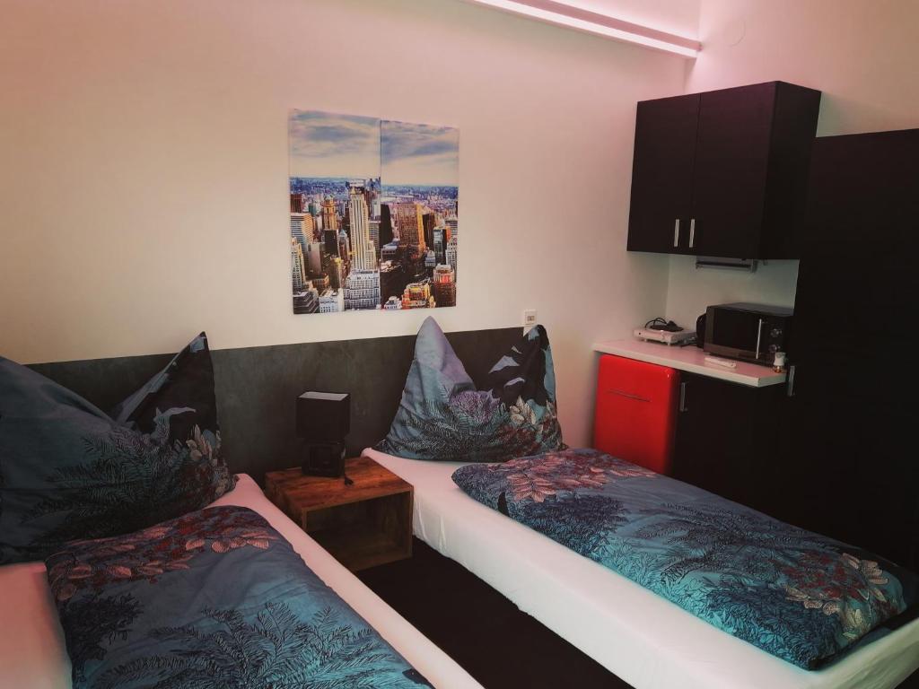 Postel nebo postele na pokoji v ubytování Motel Graz Ost