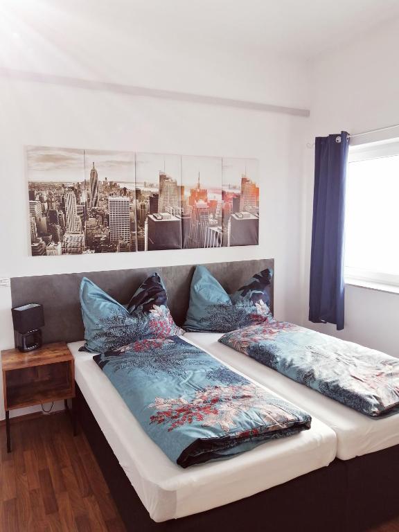 Postel nebo postele na pokoji v ubytování Motel Graz Ost