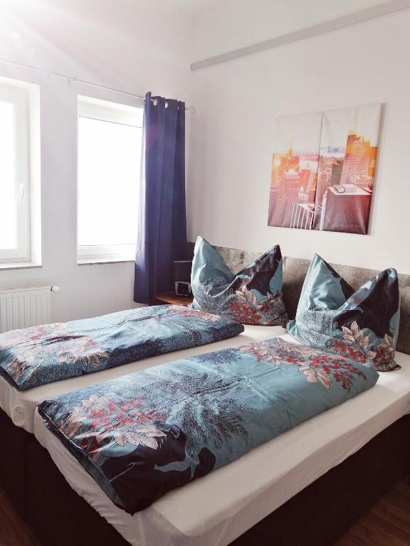 Postel nebo postele na pokoji v ubytování Motel Graz Ost