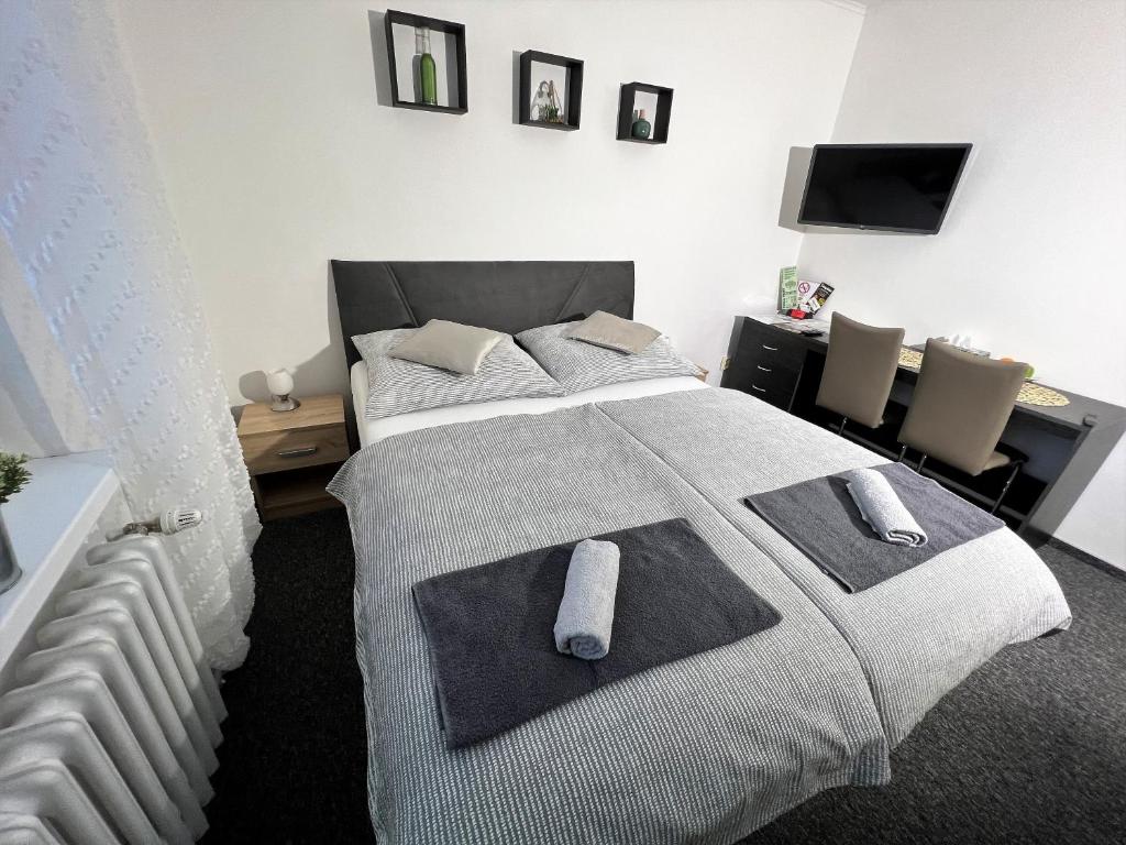 Voodi või voodid majutusasutuse Apartmány Karlovy Vary toas