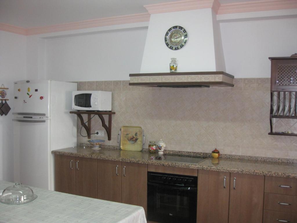Kuchyň nebo kuchyňský kout v ubytování Villa Remedios