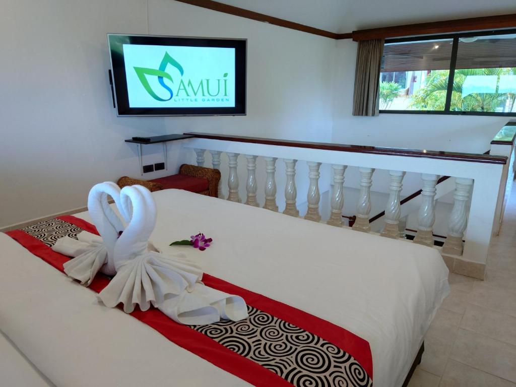 Postel nebo postele na pokoji v ubytování Samui Little Garden Resort