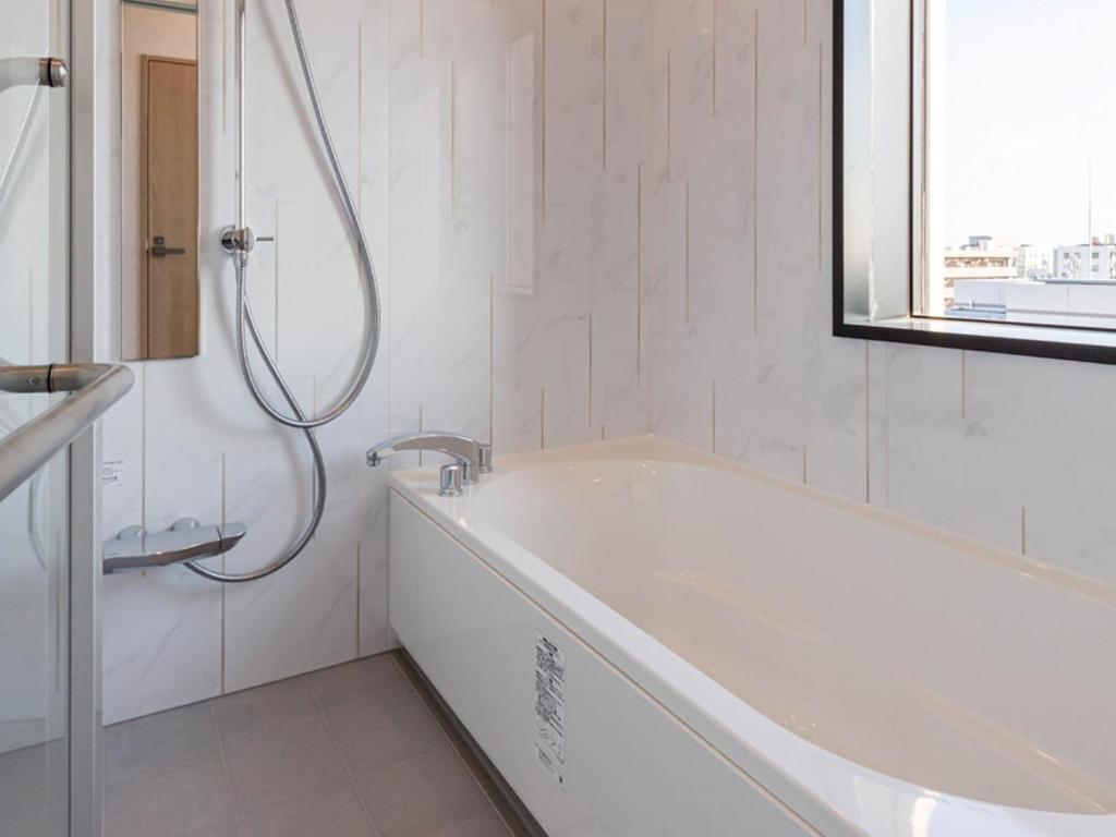 Koupelna v ubytování Akabane Holic Hotel