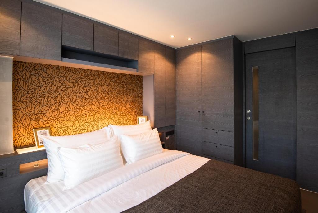 Postel nebo postele na pokoji v ubytování Квартира 1спальня CitygateKamala D508 IBG Property