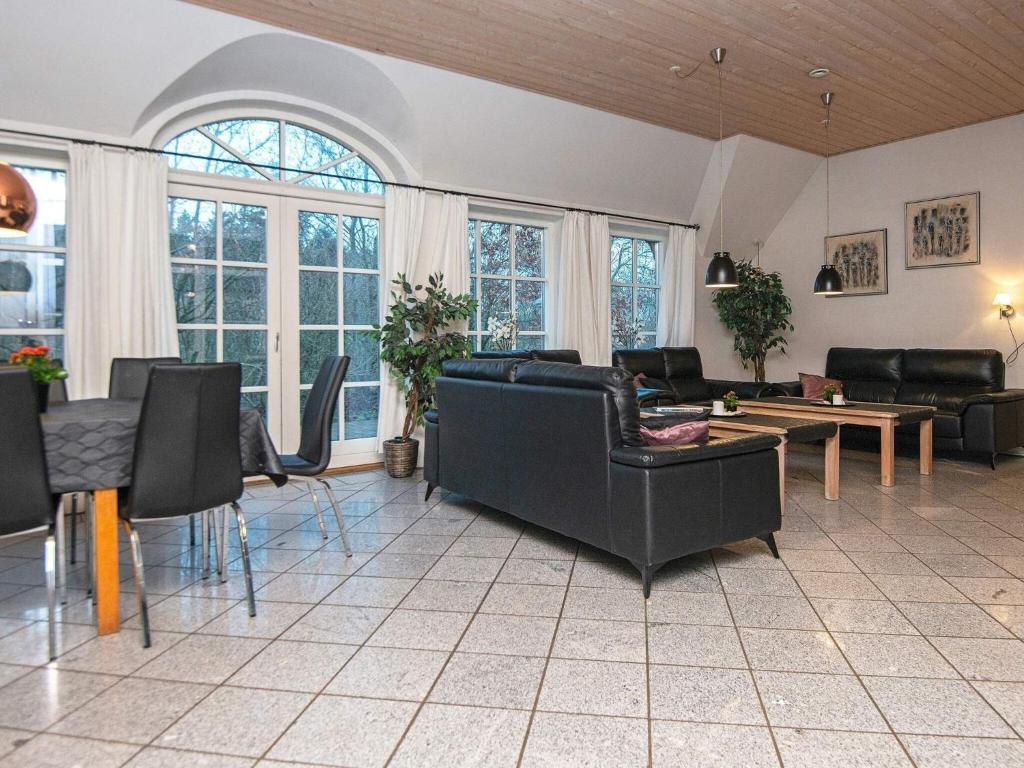 Posezení v ubytování 18 person holiday home in Ulfborg-By Traum