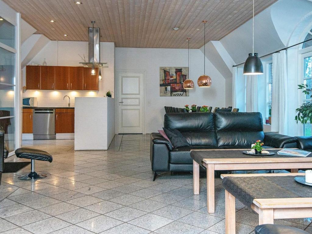 Kuchyň nebo kuchyňský kout v ubytování 18 person holiday home in Ulfborg-By Traum