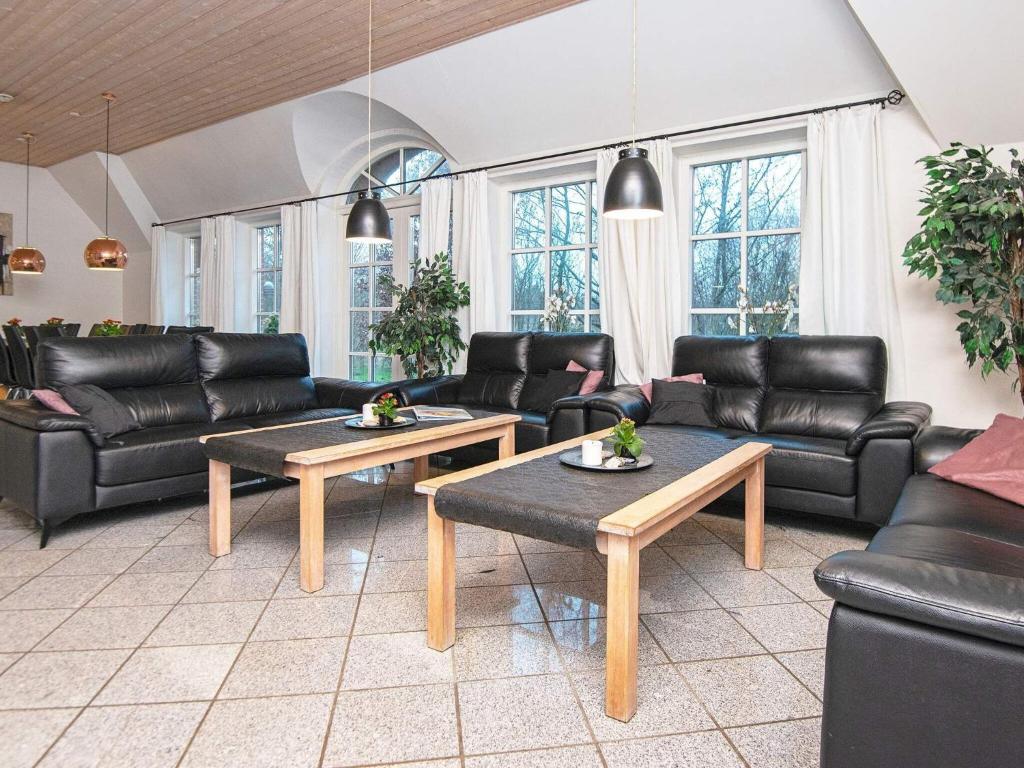 Posezení v ubytování 18 person holiday home in Ulfborg-By Traum
