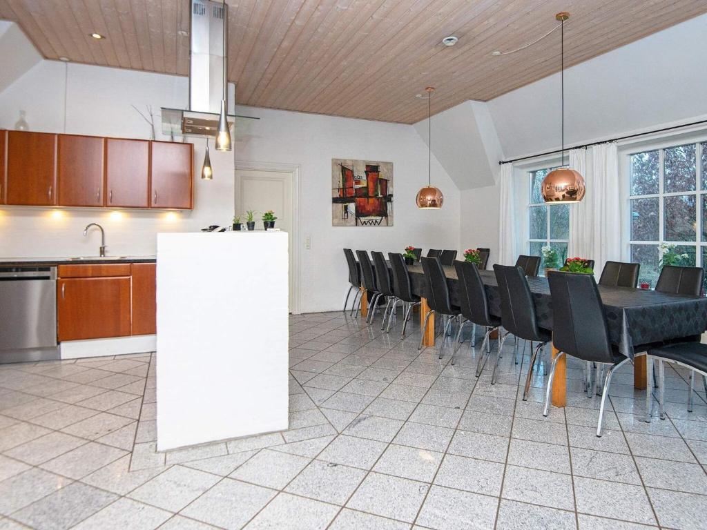 Kuchyň nebo kuchyňský kout v ubytování 18 person holiday home in Ulfborg-By Traum