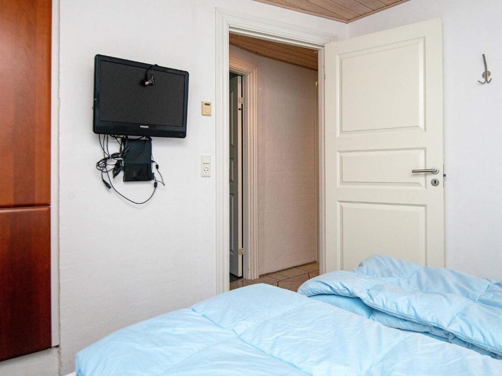Postel nebo postele na pokoji v ubytování 18 person holiday home in Ulfborg-By Traum
