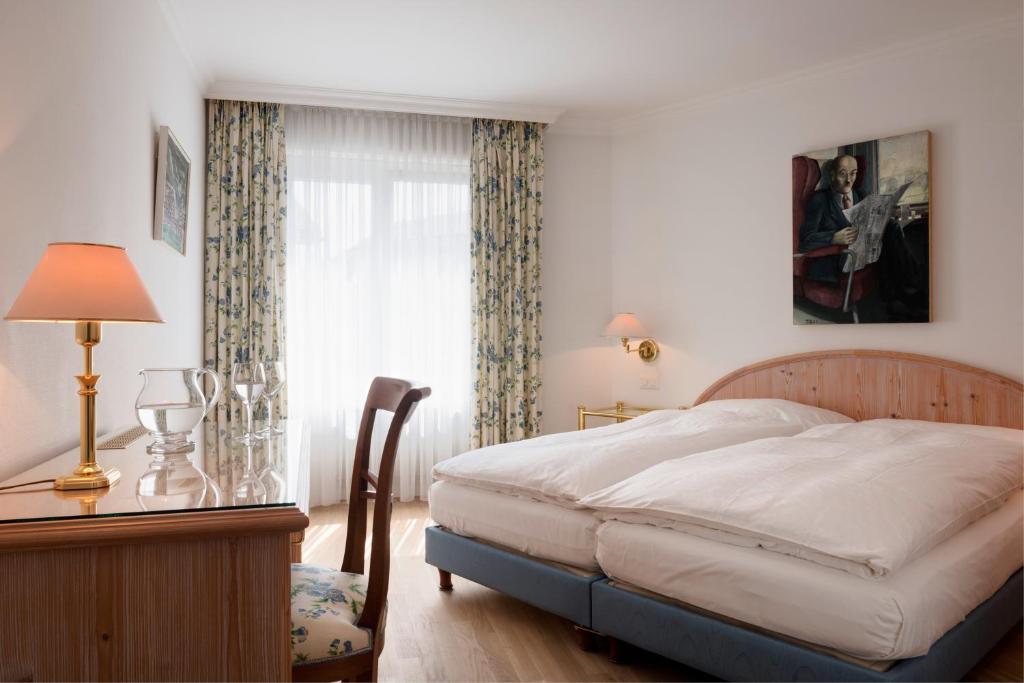 Katil atau katil-katil dalam bilik di KunstHotel Linde Garni