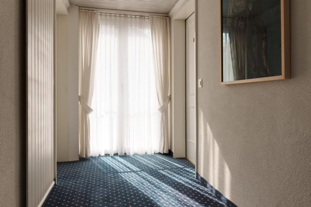 Katil atau katil-katil dalam bilik di KunstHotel Linde Garni