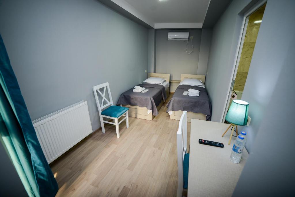 Postel nebo postele na pokoji v ubytování Lemon