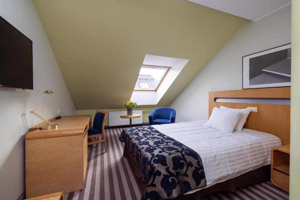 Voodi või voodid majutusasutuse Hotel Soho toas